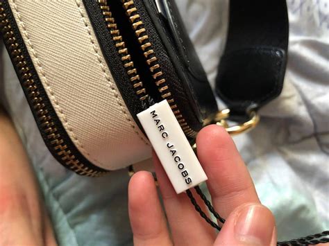 how to spot a fake marc jacobs makeup bag|marc jacobs knock off bags.